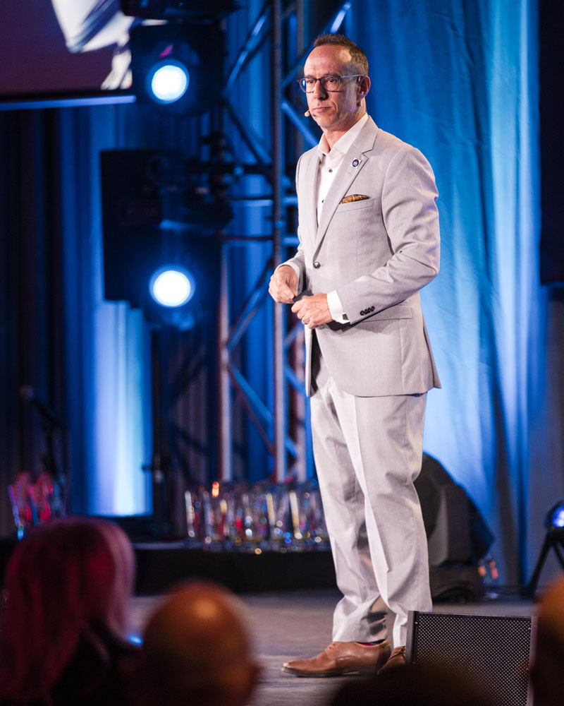 JF Champagne presenting at an industry event